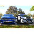 Rugged Dual HCS-D40R Electric Vehicle Charging Station, Blue Chevy Volt and White Nissan Leaf