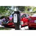 Dual EV Charging Station with Red Tesla and Nissan Leaf